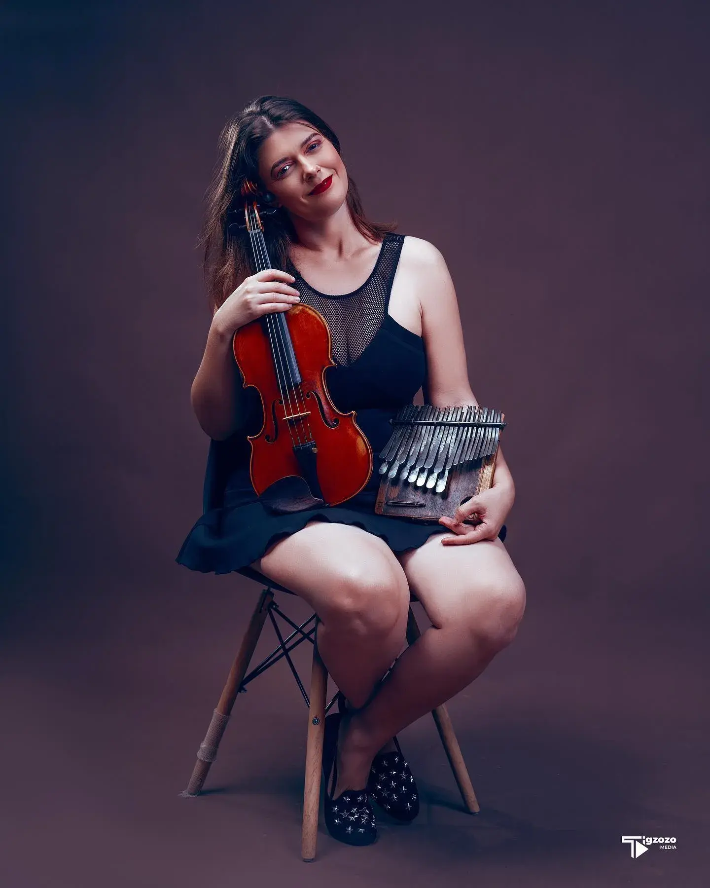 Videographer filming in mountains