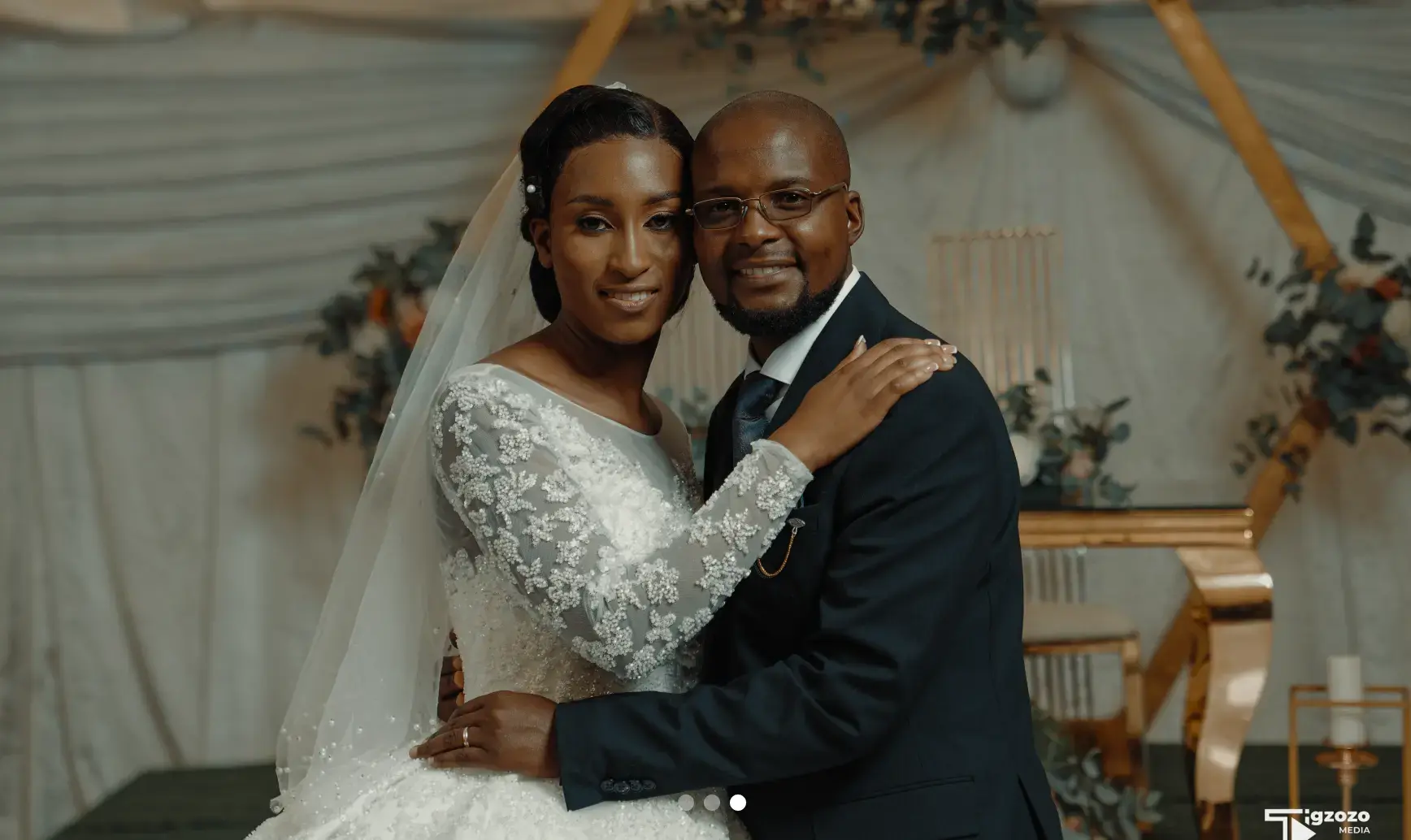 Videographer filming in mountains
